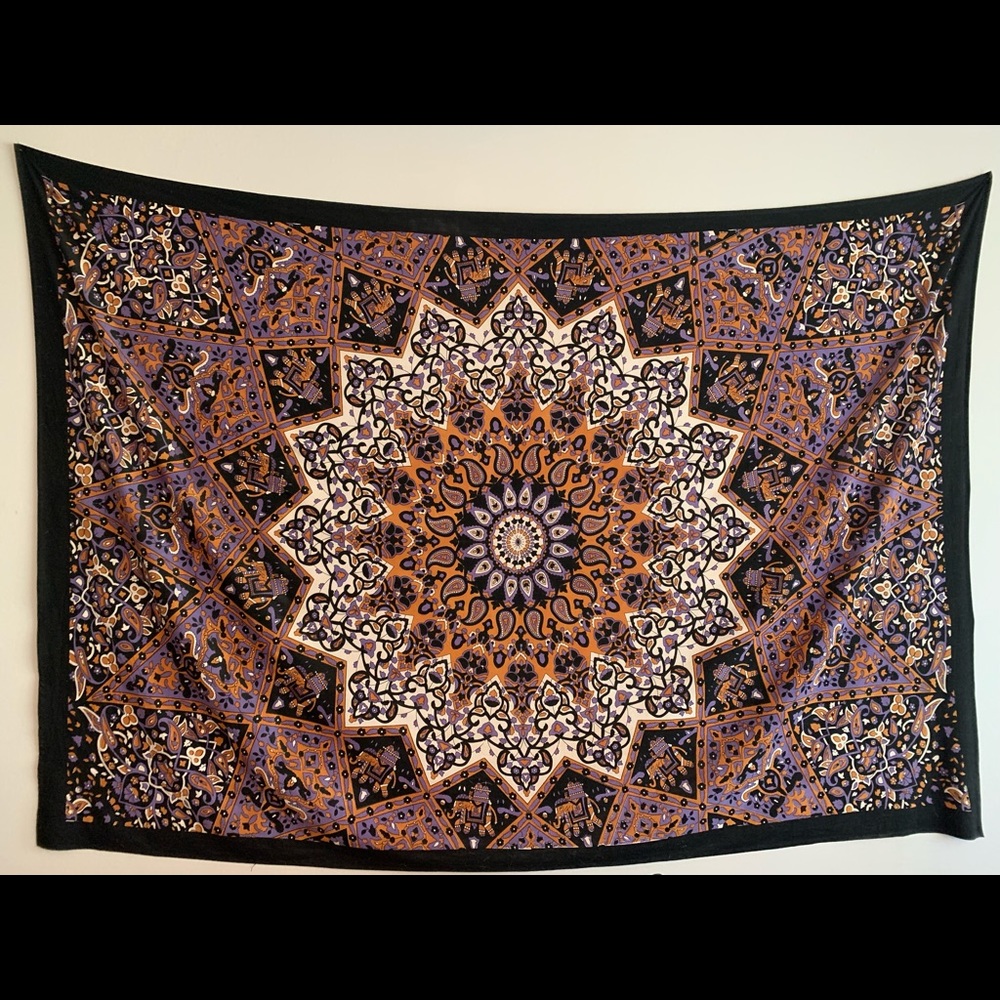 Tapestry with purple and gold tones. Great condition.
